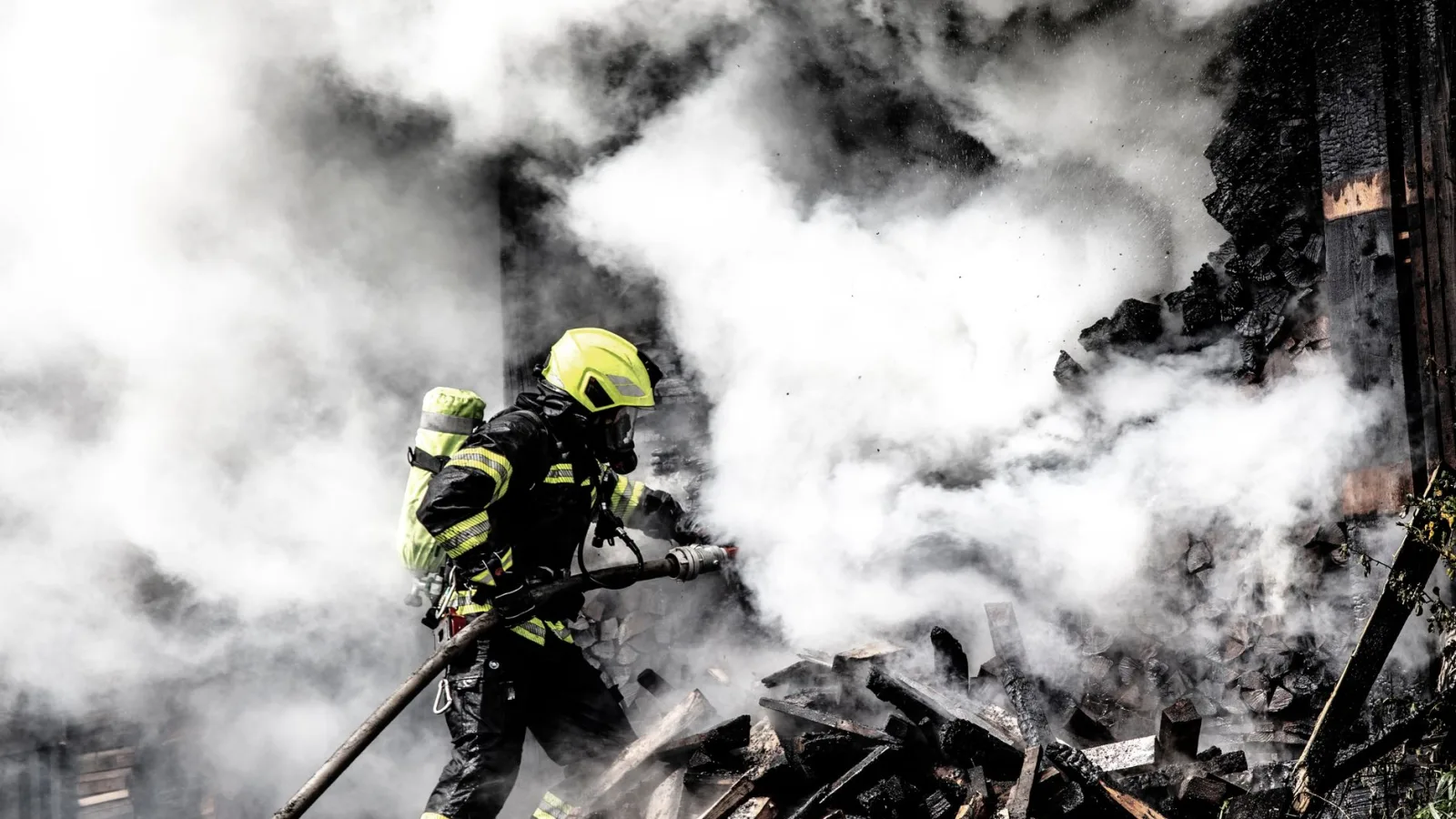 Man arrested on arson suspicion as Washington state wildfire forces 60,000 from Spokane homes